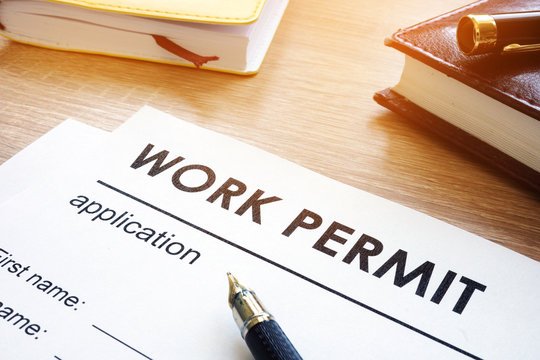 Image of filing work permits to an orginization 