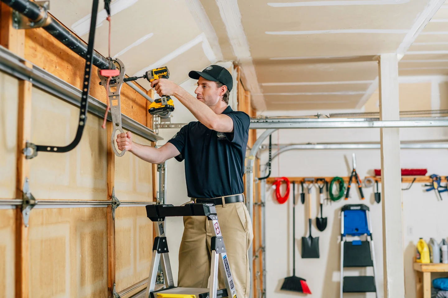 Garage door installation technician